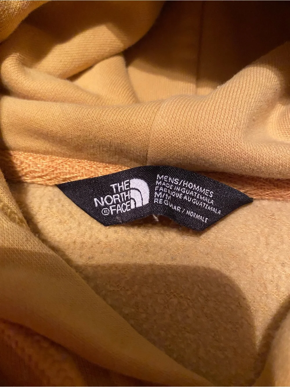 The North Face Mustard Yellow Pullover Hoodie with Black Logo